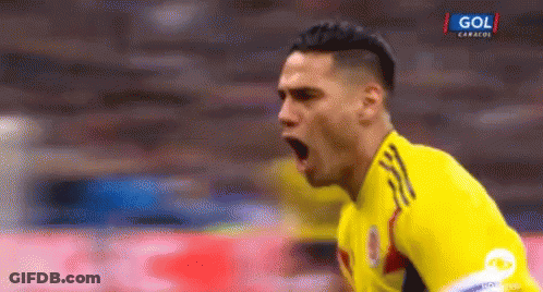Soccer Player In Yellow Jersey Saying Gol GIF