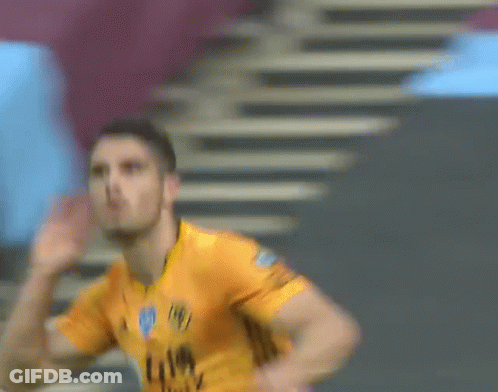 Soccer Player In Yellow Jersey With Blue Eye GIF
