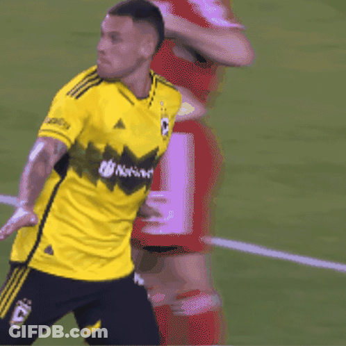 Soccer Player In Yellow Nationals Shirt GIF