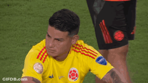 Soccer Player In Yellow Shirt Saying FIFA GIF