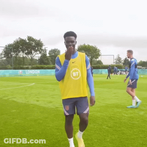 Soccer Player In Yellow Vest And Blue Shorts GIF