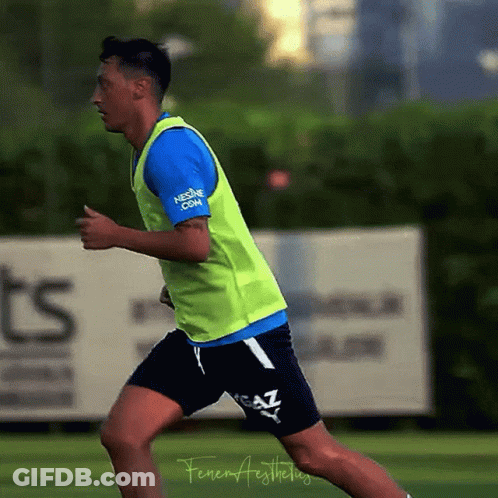 Soccer Player In Yellow Vest Saying Nescafe.com GIF
