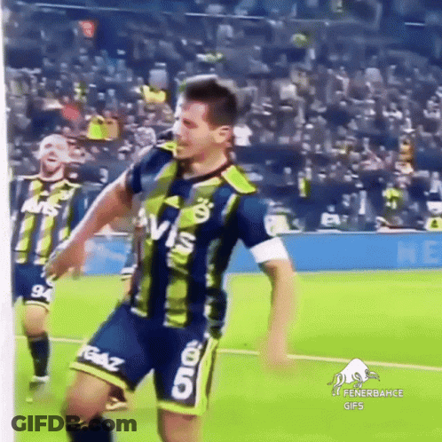 Soccer Player Jumping In Avis Shirt GIF