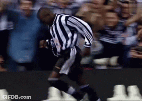 Soccer Player Jumping In Black And White Jersey GIF