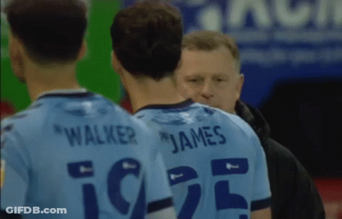 Soccer Player Jumping In The Air On Field GIF