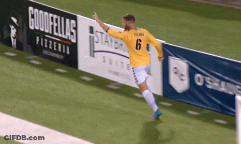 Soccer Player Jumping In Yellow Jersey Number 6 GIF