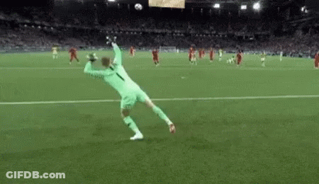 Soccer Player Jumping To Catch Soccer Ball GIF