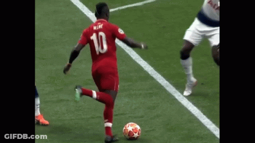 Soccer Player Kicking Ball GIF