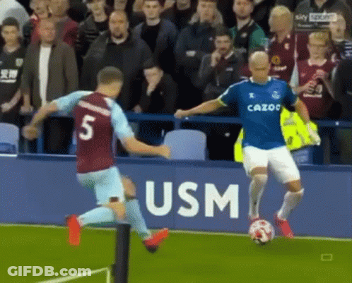 Soccer Player Kicking Ball In Blue Cazoo Shirt GIF