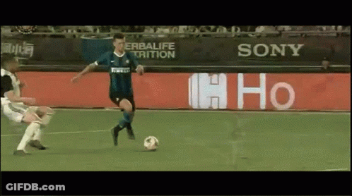 Soccer Player Kicking Ball In Front Of Sony Sign GIF