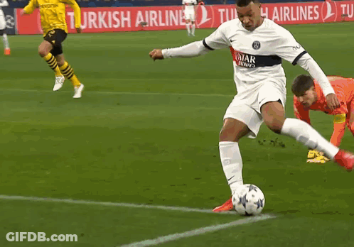 Soccer Player Kicking Ball In Front Of Turkish Airlines Sign GIF