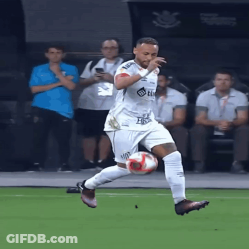 Soccer Player Kicking Ball In White HC Jersey GIF