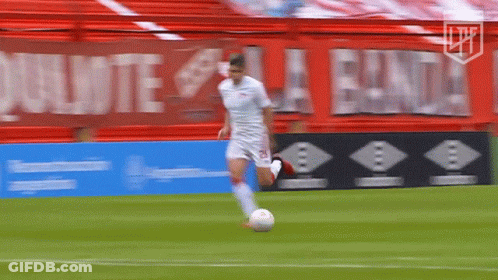 Soccer Player Kicking Ball With Lpe Sign GIF