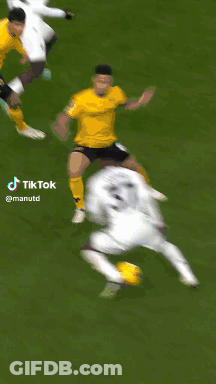 Soccer Player Kicking Yellow Ball GIF