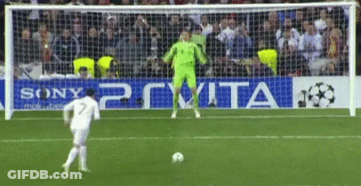 Soccer Player Kicks Ball In Front Of Sony PS Vita Ad GIF