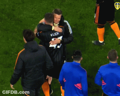 Soccer Player Klich Hugging Another Player GIF