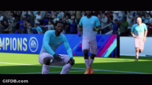 Soccer Player Kneeling In Front Of Champions Banner GIF