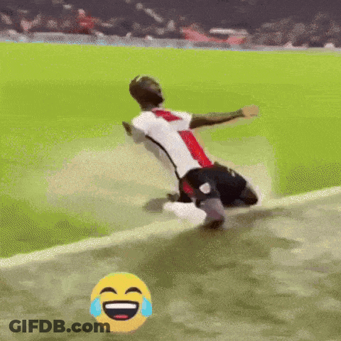 Soccer Player Kneeling With Laughing Smiley Face GIF