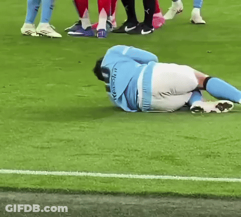 Soccer Player Laying Head On Ground GIF