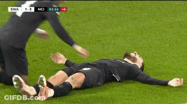 Soccer Player Laying On Field GIF
