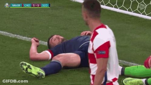 Soccer Player Laying On Ground Other Standing GIF