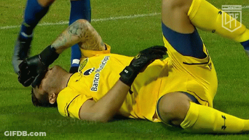 Soccer Player Laying On Ground With Banco Municipal GIF