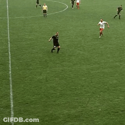 Soccer Player Laying On Ground With Flaming Knee GIF