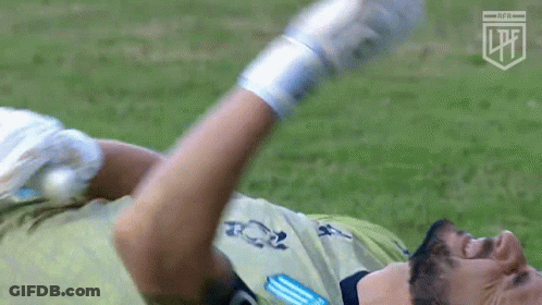 Soccer Player Lying Down Arms Outstretched Gloves GIF
