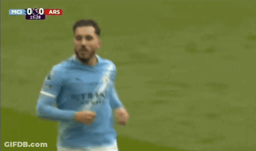 Soccer Player Lying Head On Ground GIF