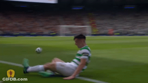 Soccer Player Lying Kicking Ball GIF