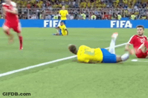Soccer Player Lying On Field GIF