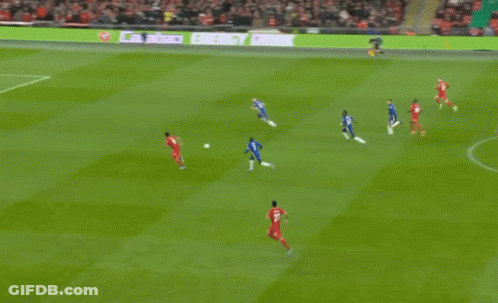 Soccer Player Lying On Ground Leg Up GIF