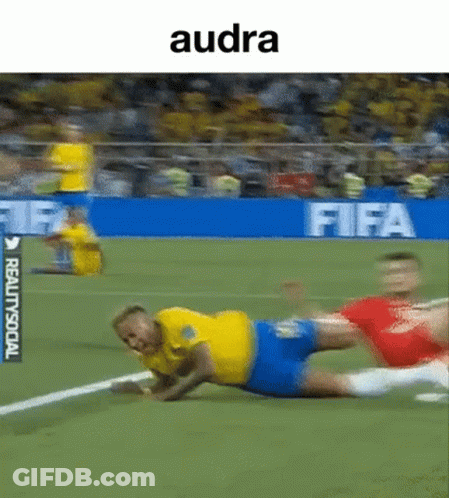 Soccer Player Lying On Ground Teammate Rising GIF