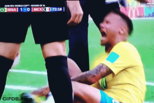 Soccer Player Lying On Ground With Mouth Open GIF