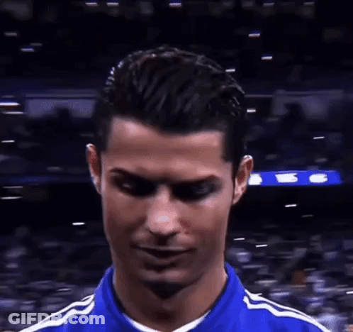 Soccer Player Making Funny Face In Blue Shirt GIF