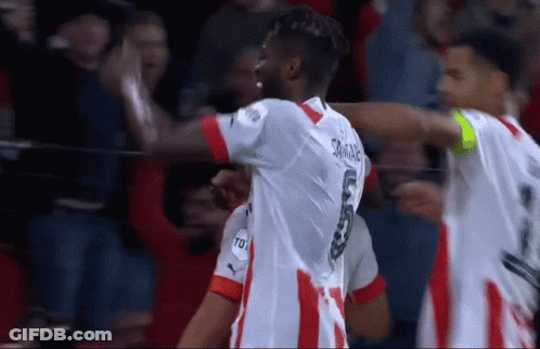 Soccer Player Number 10 Celebrating With Teammates GIF