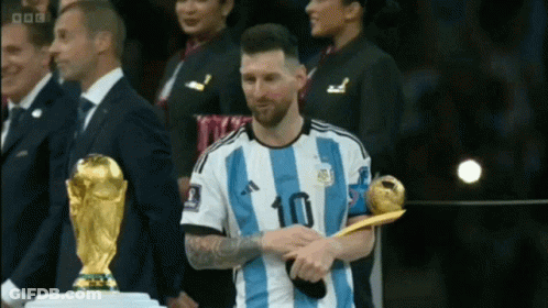 Soccer Player Number 10 Holding Trophy GIF