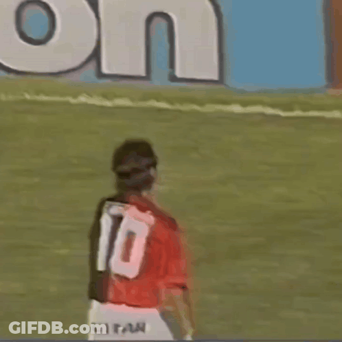 Soccer Player Number 10 Hugging Another Player GIF