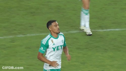 Soccer Player Number 10 Hugging Another Player GIF