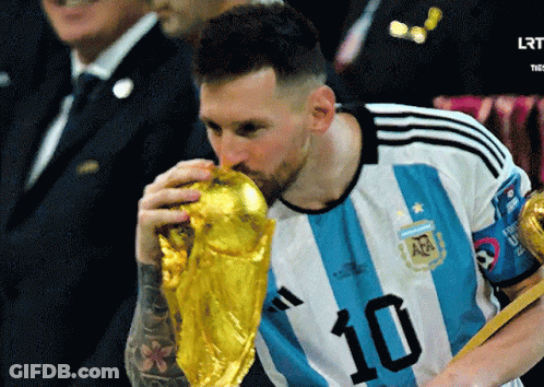 Soccer Player Number 10 Kissing Trophy GIF