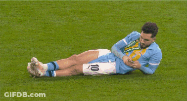 Soccer Player Number 10 Laying On Ground GIF