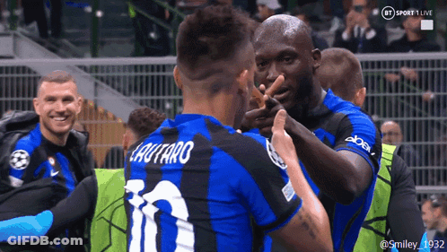 Soccer Player Number 10 Surrounded By Teammates GIF
