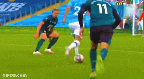 Soccer Player Number 11 Dribbling Ball GIF