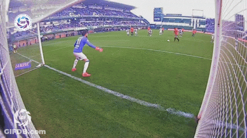 Soccer Player Number 11 Kicking Ball GIF