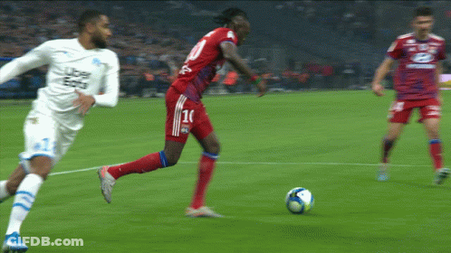 Soccer Player Number 11 Kicking Ball GIF