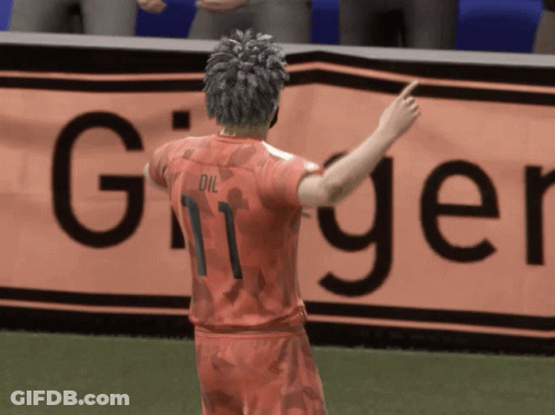 Soccer Player Number 11 Pointing To Ginger Sign GIF