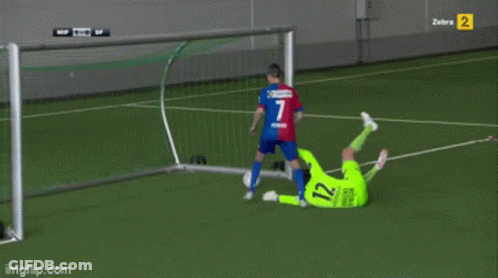Soccer Player Number 12 Laying On Ground GIF