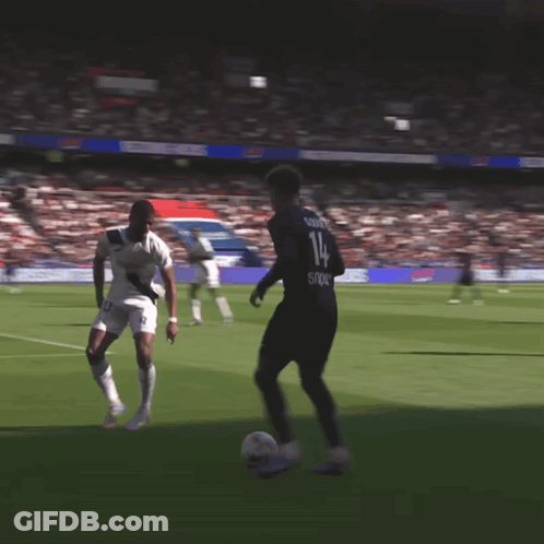 Soccer Player Number 14 Kicking Ball GIF