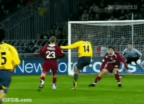 Soccer Player Number 14 Kicking Ball GIF