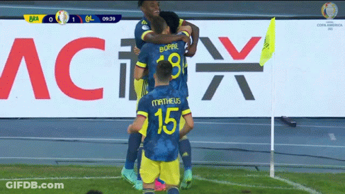 Soccer Player Number 15 Hugging Teammates GIF